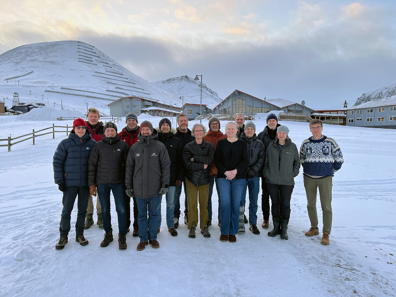 Group photo in an Arctic landscape.